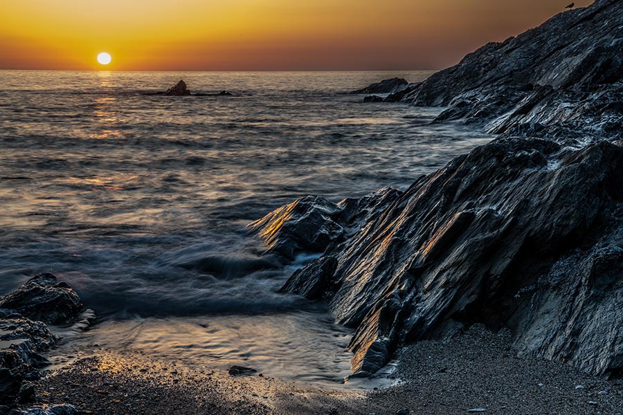 Sonnenuntergang an der Küste von Cornwall